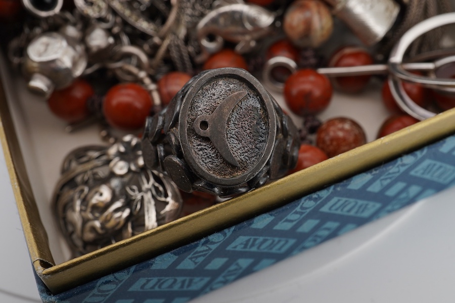 A mixed group of silver jewellery, including two charm bracelets, an Art Nouveau-style pendant; a pocket watch on chain; a pair of moonstone earrings; an onyx and marcasite pendant; a cross pendant; a carnelian pendant;